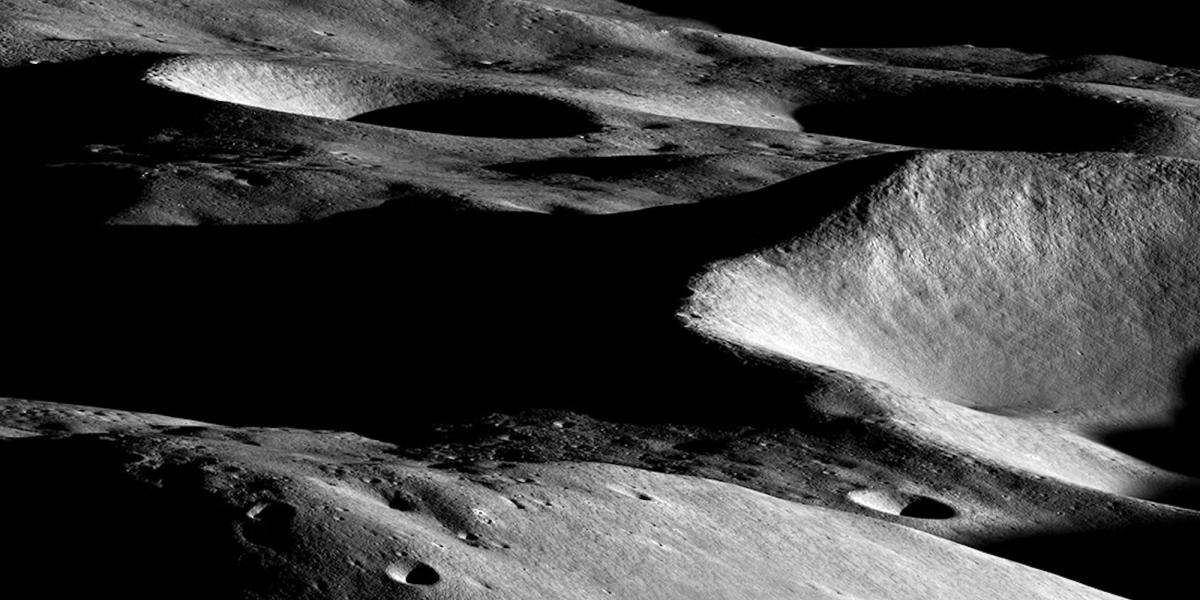 Shadows stretch around Malapert Massif, a mountain near the moon's South Pole.