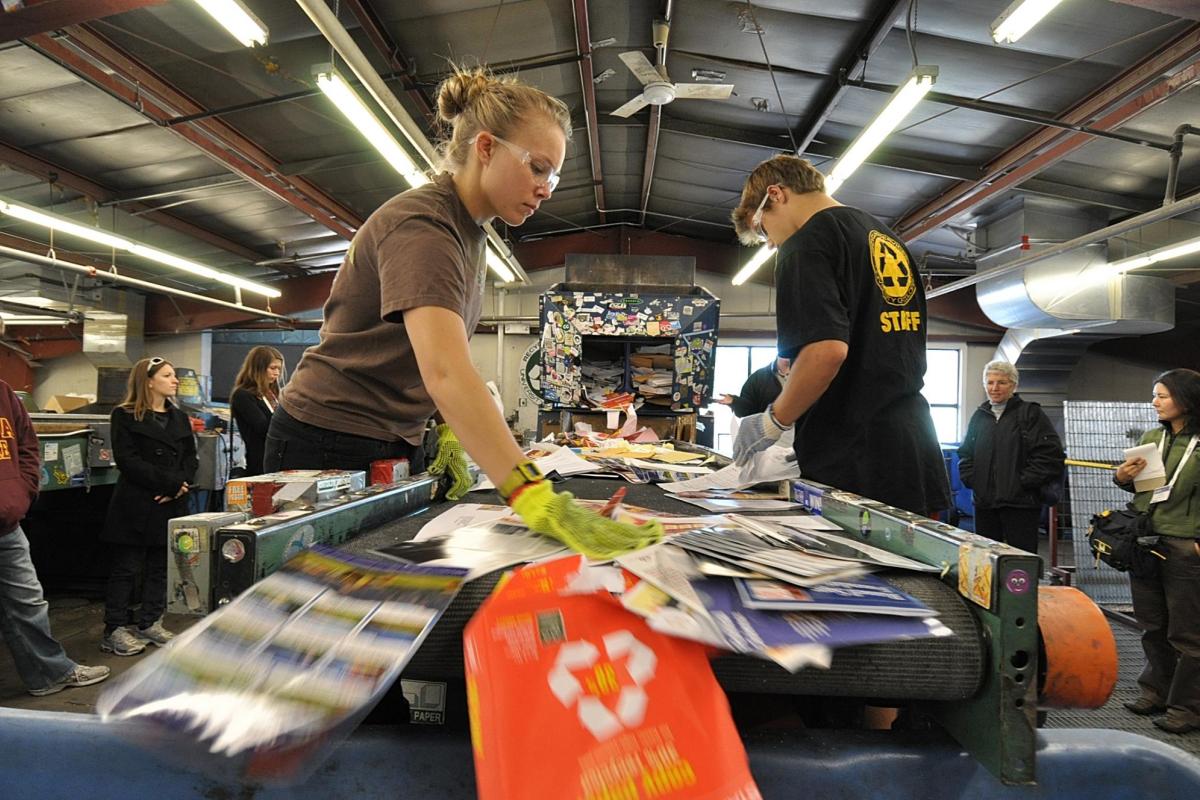 Students sorting recycled materials on campus