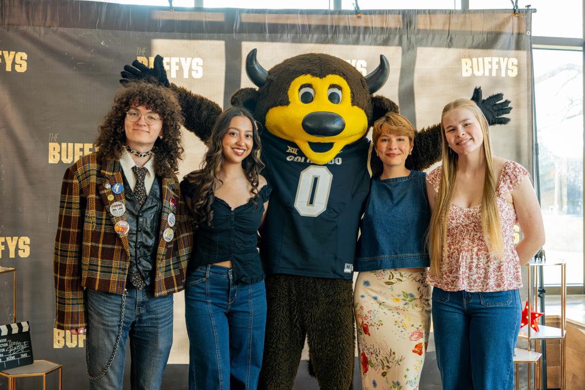 Students pose with Chip at The Buffys